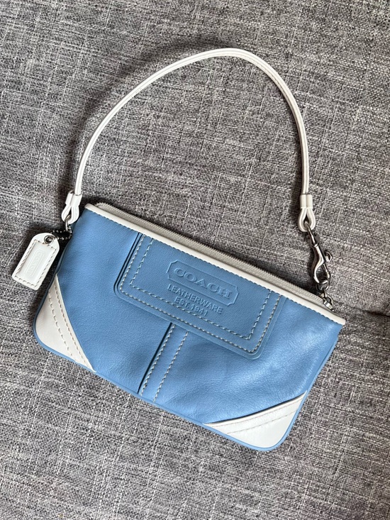 Coach Handbags - COACH Light Blue and White Leather Wristlet Clutch